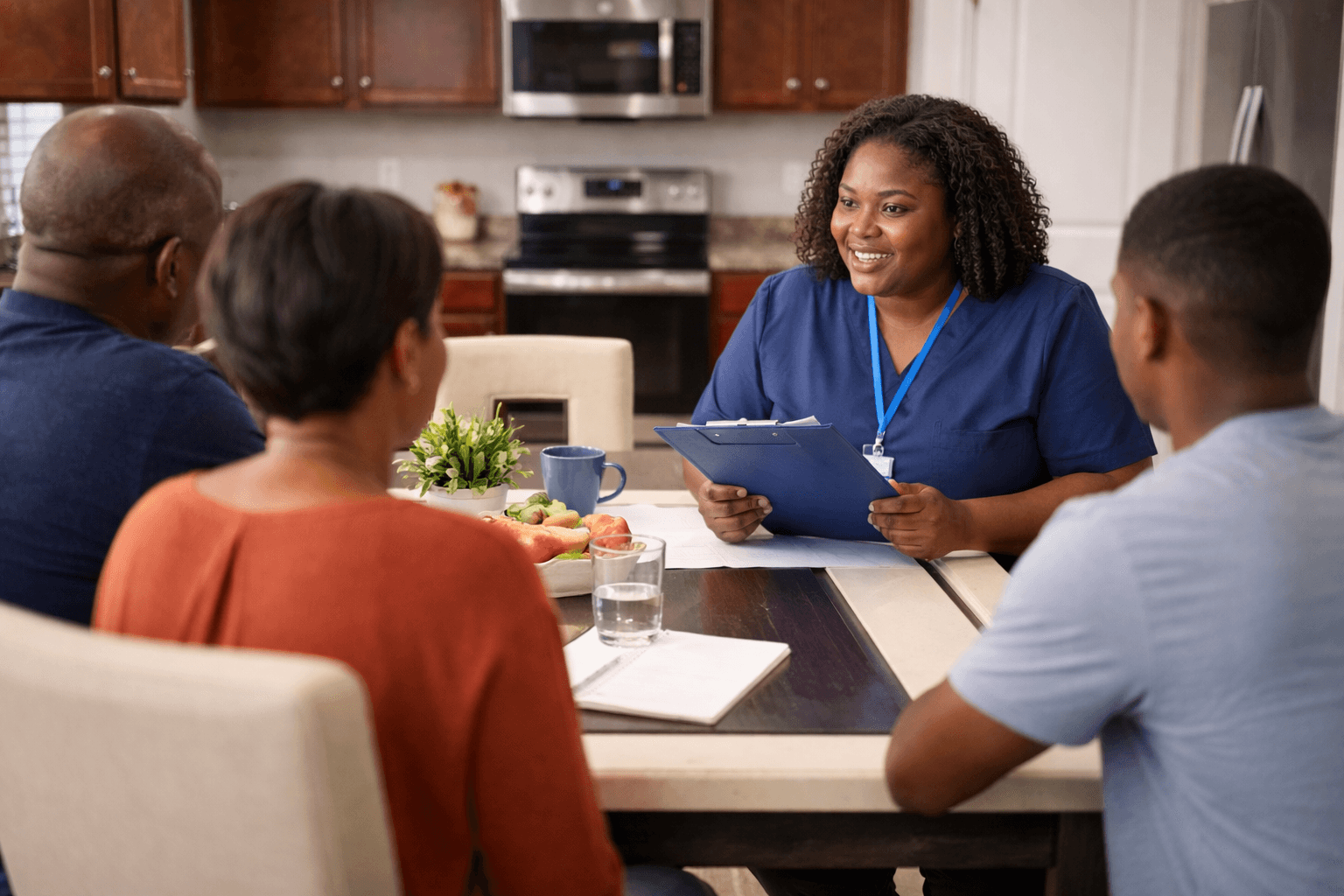 Care professional meeting with family